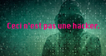 One Thing To Do Today: Threat Model Part 2, Who is the threat anyway? A hoodie with no face visible, 1's and 0's with pink text stating - Ceci n’est pas une hacker.