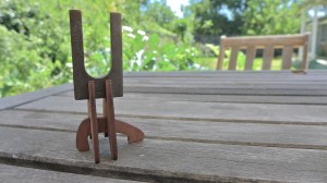 staple on woodend stand on a table in a garden