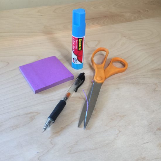 A pen for doodling, scissors, the post-it notes, restickable-adhesive glue stick.