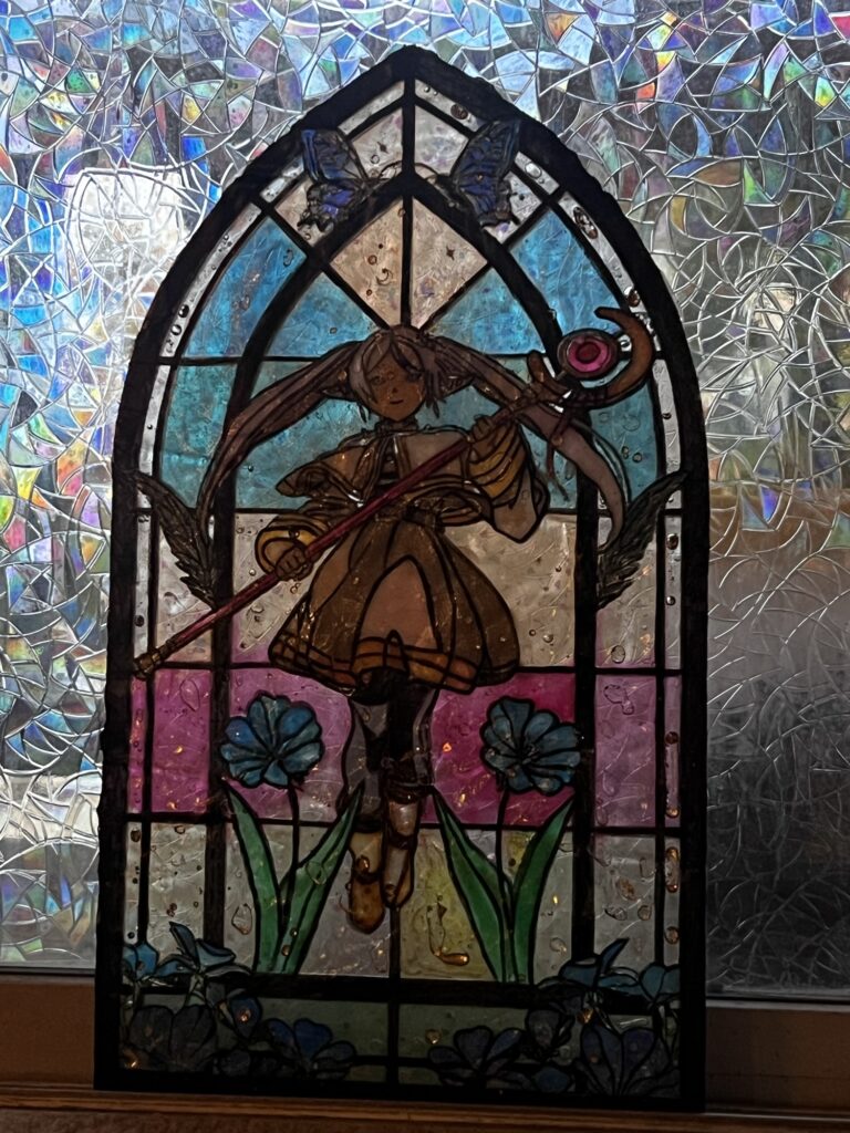 close up of partially finished laser cut stained glass project